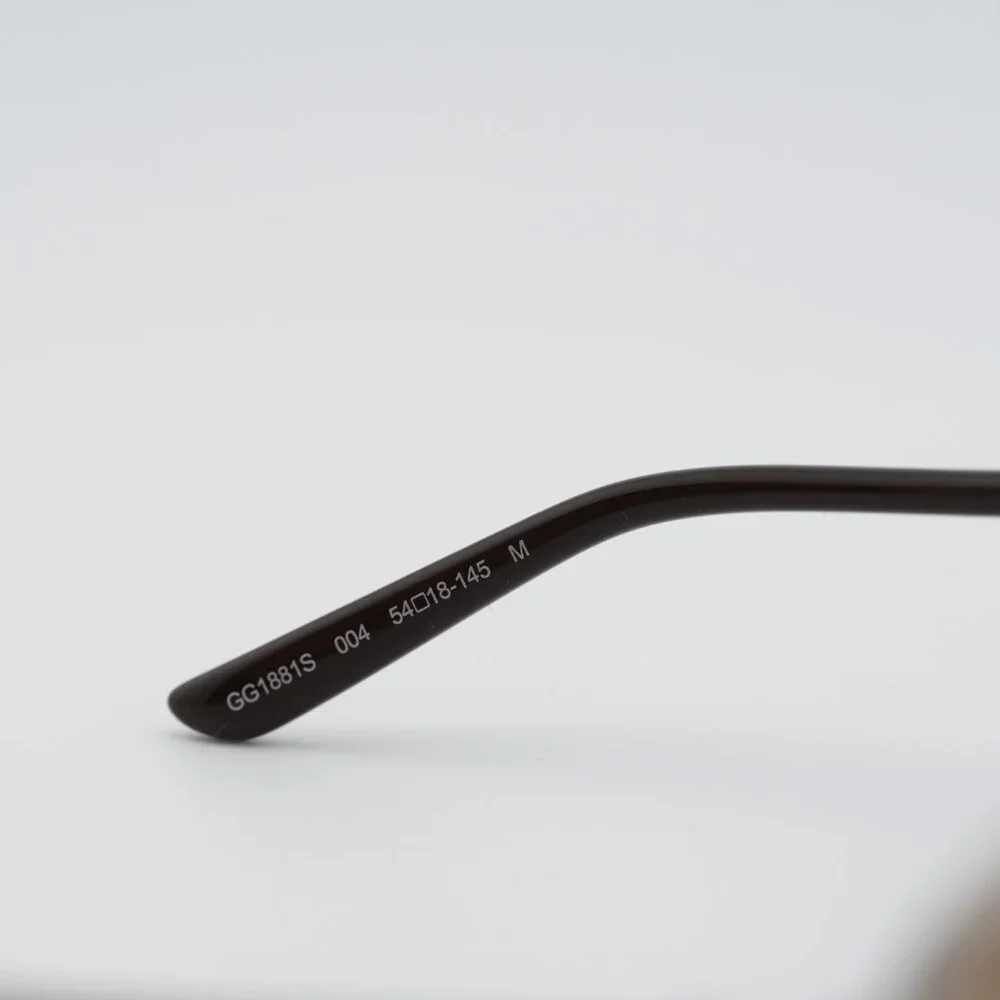 Gucci GG1881S 004 Sunglasses Silver Square Frame, Brown with GG Pattern Lenses